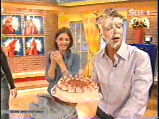 women caked on TV show