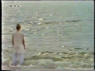 RTL - lady wading wearing white trousers-qt