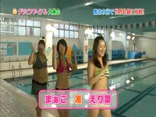 Japanese girl clothed swimmming.