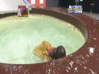 Japanese girl into the rotion oil pool.