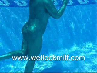 Wetlook Milf swimming in Shiny catsuit