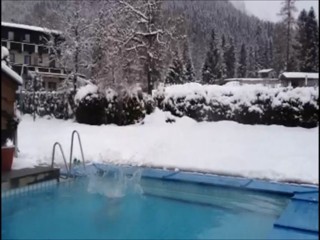 Girl jumps in pool