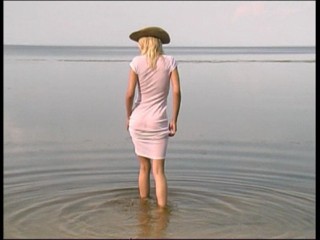 White dress on beach wetlook