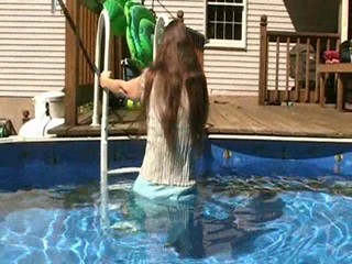 Clips from Jennifer's long aqua skirt video