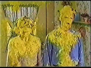 A Man & Women get Covered in Yellow Gunge